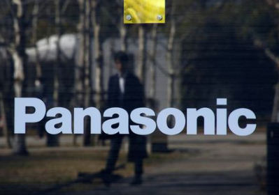 A man is reflected on Panasonic Corp's logo at Panasonic Center in Tokyo, Japan, February 2, 2017. REUTERS/Kim Kyung-Hoon