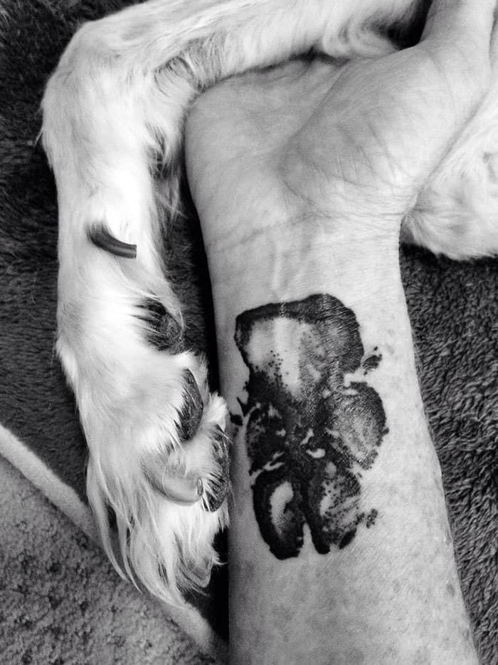 The Paws Of The Dogs Are Being Tattooed On Their Owners And The Result Is Adorable