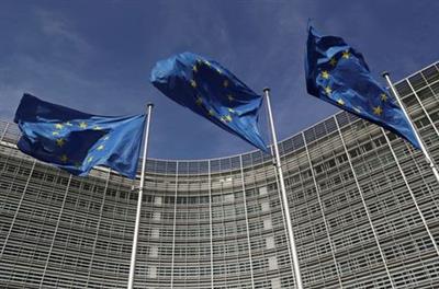 FILE PHOTO: European Union flags flutter outside the European Commission headquarters in Brussels, Belgium, March 24, 2021. REUTERS/Yves Herman