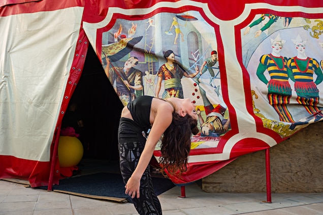 At the Circo Raluy Legacy in Spain, Emily Raluy warms up for an acrobatic pole dance that she will perform
with her sister. Many circuses include family groups and are matriarchal, Gengotti says.