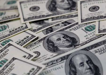 U.S. one hundred dollar notes are seen in this picture illustration taken in Seoul February 7, 2011. REUTERS/Lee Jae-Won
