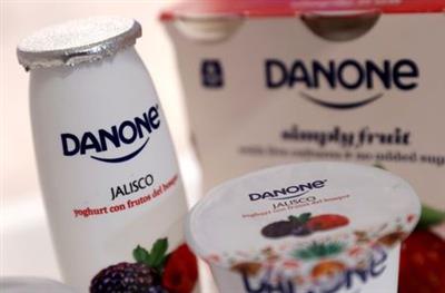 Company logos are seen on products displayed before French food group Danone 2019 annual results presentation in Paris, France, February 26, 2020. REUTERS/Christian Hartmann