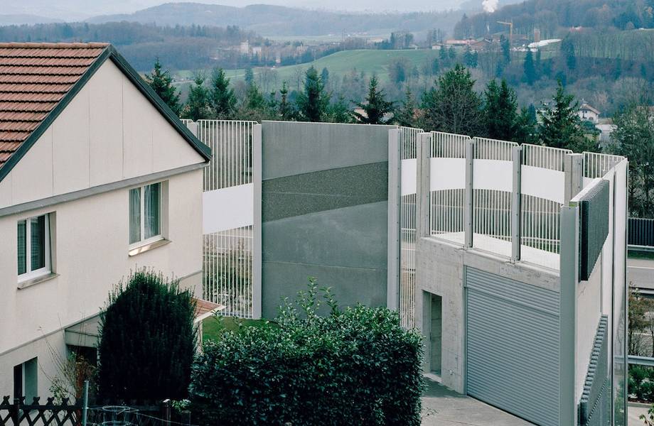 Почему вокруг домов Швейцарии возводят многометровые стены где и как,городская среда,кто,реомнт и строительство