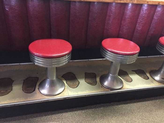 The Flooring At This Cafe Has Been Worn Down By The Feet Of Customers Over The Years