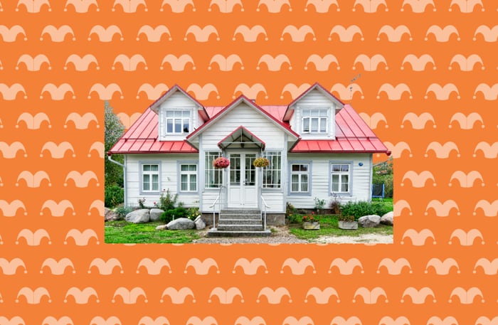 A house against an orange background