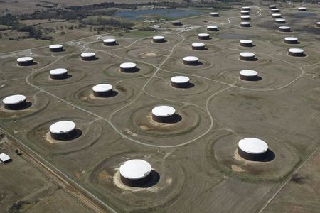 FILE PHOTO: Crude oil storage tanks are seen from above at the Cushing oil hub, in Cushing, Oklahoma, March 24, 2016. REUTERS/Nick Oxford/File Photo 