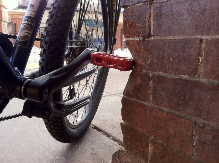 This Exterior Corner Next To The Front Door Of The Local Bike Shop Shows Significant Wear From The Last 30 Some Years Of Customers Striking It With Their Pedals