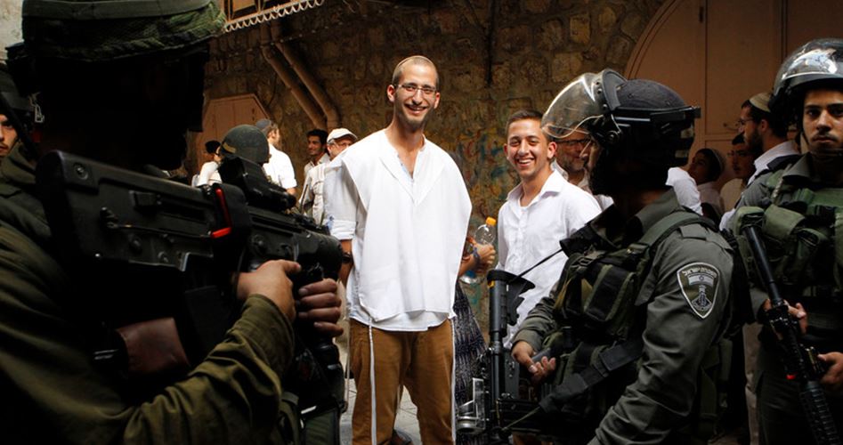 west_bank_soldiers_guarding_settlers