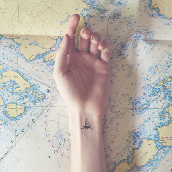tiny-tattoo-sail-boat-map-world
