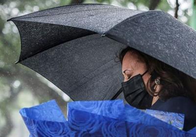 U.S. Vice President Kamala Harris lays flowers at the Senator John McCain's memorial site, where his Navy aircraft was shot down by the North Vietnamese, on the three-year anniversary of his death, in Hanoi, Vietnam, August, 25, 2021. REUTERS/Evelyn Hockstein/Pool  TPX IMAGES OF THE DAY