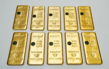 The Sicpa Oasis validator system (bullion protect) is pictured on one kilogram bar of gold at Swiss refiner Metalor in Marin near Neuchatel, Switzerland July 5, 2019. Picture taken July 5, 2019. To match Special Report GOLD-SWISS/FAKES REUTERS/Denis Balibouse