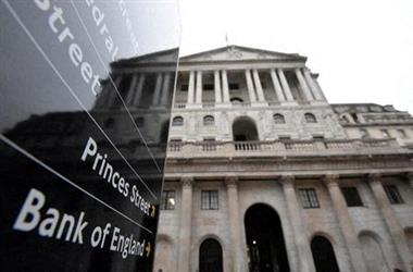 The Bank of England (BoE) building is reflected in a sign, after the BoE became the first major world's central bank to raise rates since the coronavirus disease (COVID-19) pandemic, London, Britain, December 16, 2021. REUTERS/Toby Melville