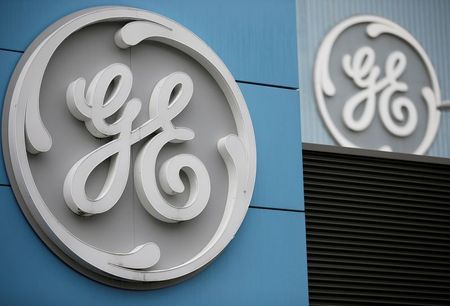 FILE PHOTO: The logo of U.S. conglomerate General Electric is seen on the company building in Belfort, France, October 19, 2019. REUTERS/Vincent Kessler/File Photo GLOBAL BUSINESS WEEK AHEAD