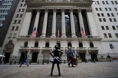 FILE PHOTO: The New York Stock Exchange is pictured in the Manhattan borough of New York City, New York, U.S., April 16, 2021. REUTERS/Carlo Allegri/File Photo 