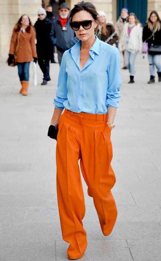 Оранжевые брюки с чем носить женщинам