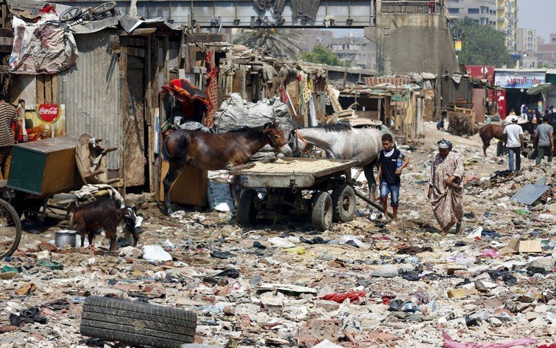 Eshash el-Sudan в районе Мухандисин города Гиза, к югу от Каира, Египет Eshash el-Sudan в районе Мухандисин города Гиза, к югу от Каира, Египет грязь, изнанка, курорты, нищета, путешествия, трущобы
