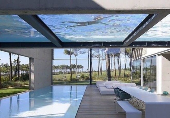 The Wall House в Португалии в котором бассейн позволяет плавать в воздухе