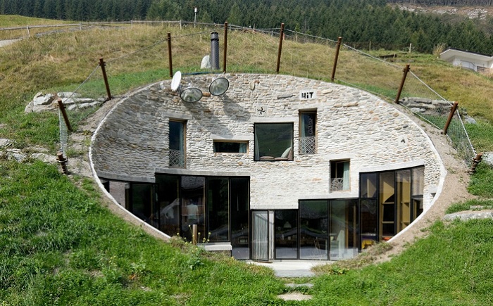 Возвращение к «пещерным» истокам: вилла, вырытая в альпийском холме Возвращение к «пещерным» истокам: вилла, вырытая в альпийском холме разное,строительство и ремонт