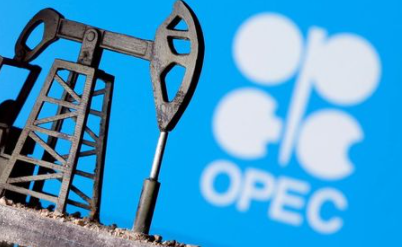 A 3D printed oil pump jack is seen in front of displayed OPEC logo in this illustration picture, April 14, 2020. REUTERS/Dado Ruvic