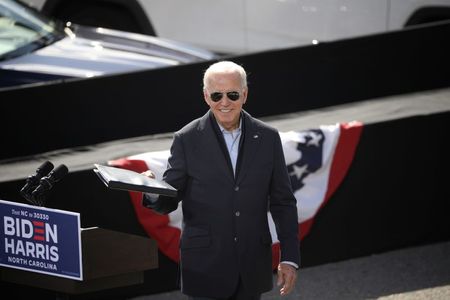 U.S. Democratic presidential candidate Joe Biden delivers remarks at a voter mobilization event at Riverside High School in Durham, North Carolina, U.S., October 18, 2020. REUTERS/Tom Brenner