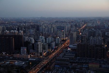A general view shows traffic during evening rush hour at the central business district (CBD) in Beijing, China, January 15, 2021. Picture taken January 15, 2021. REUTERS/Tingshu Wang