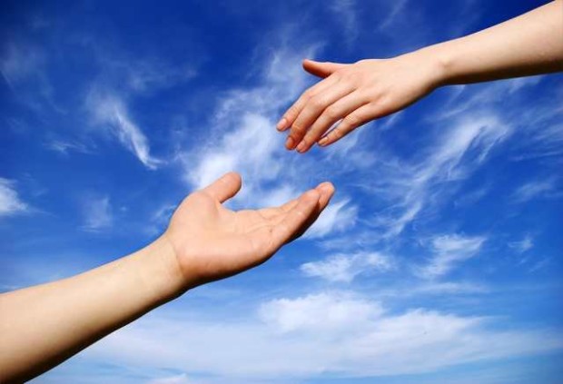 helping hand with the sky background