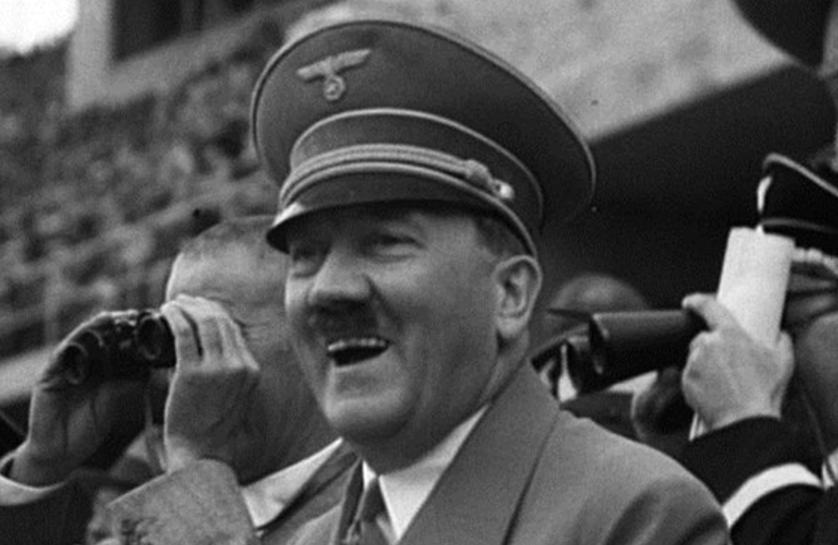 Улыбающийся Гитлер на Олимпийских играх 1936 года в Берлине.Фото: Harvard University Press