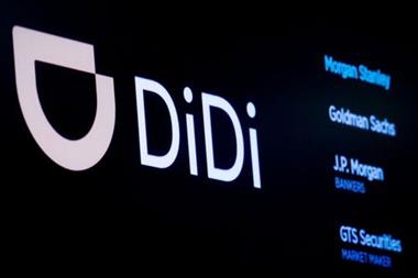 The logo for Chinese ride-hailing company Didi Global Inc is pictured during the IPO on the New York Stock Exchange (NYSE) floor in New York City, U.S., June 30, 2021. REUTERS/Brendan McDermid 