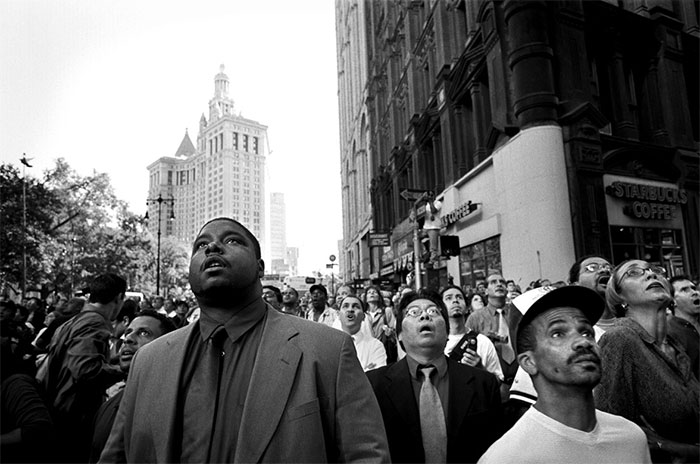 A Knot Of Bystanders At Park Row And Beekman Street Look Up As The South Tower Begins To Collapse