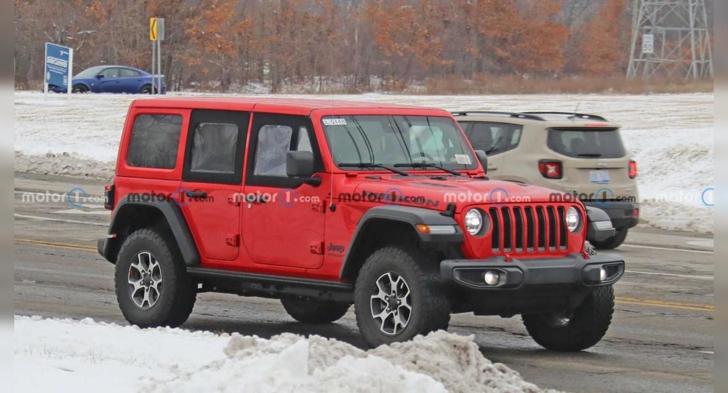 На дорогах заметили обновленную версию Jeep Wrangler с половинчатыми дверьми На дорогах заметили обновленную версию Jeep Wrangler с половинчатыми дверьми Автомобили