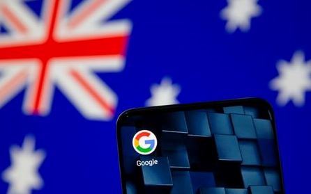 Smartphone with google app icon is seen in front of the displayed Australian flag in this illustration taken, January 22, 2021. REUTERS/Dado Ruvic/Illustration