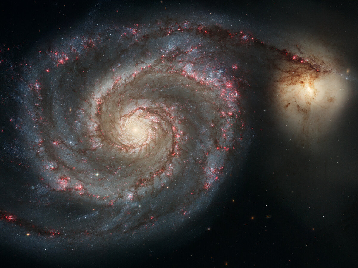 Галактики M51 («Водоворот») и NGC 5195 — снимок телескопа Hubble. NASA/ESA/STScI.