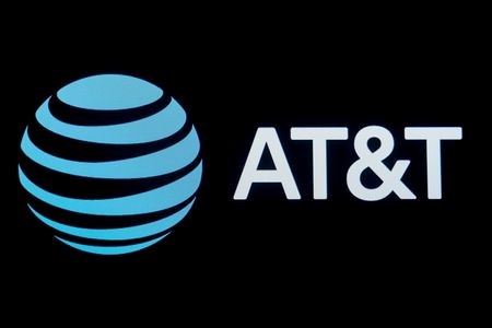 The company logo for AT&T is displayed on a screen on the floor at the New York Stock Exchange (NYSE) in New York, U.S., September 18, 2019. REUTERS/Brendan McDermid