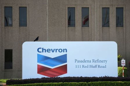 An entrance sign at the Chevron refinery, located near the Houston Ship Channel, is seen in Pasadena, Texas, U.S., May 5, 2019. REUTERS/Loren Elliott