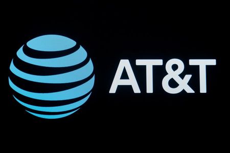 The company logo for AT&T is displayed on a screen on the floor at the New York Stock Exchange (NYSE) in New York, U.S., September 18, 2019. REUTERS/Brendan McDermid