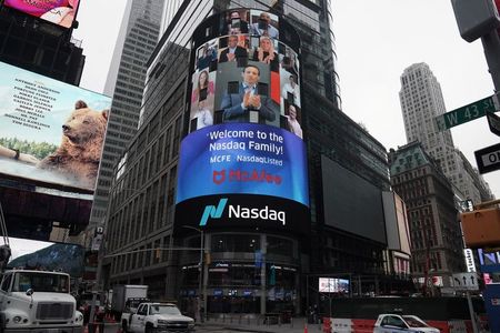 FILE PHOTO: Cyber security firm McAfee holds a virtual IPO at NASDAQ Marketsite in the Manhattan borough of New York City, New York, U.S., October 22, 2020. REUTERS/Carlo Allegri