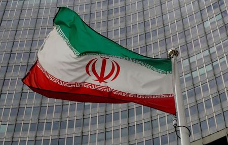 An Iranian flag flutters in front of the International Atomic Energy Agency (IAEA) headquarters in Vienna, Austria, September 9, 2019. REUTERS/Leonhard Foeger
