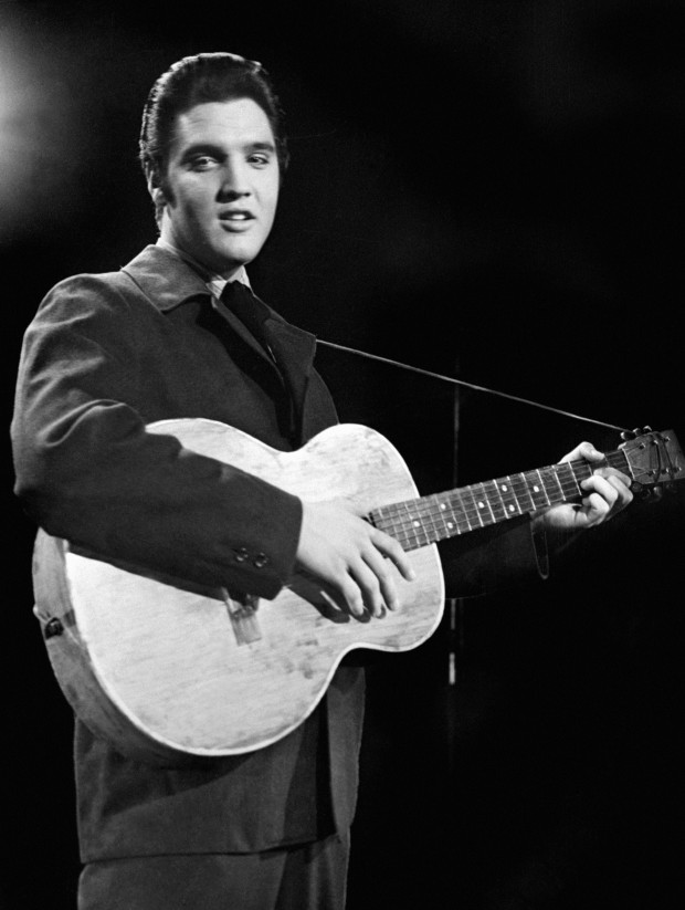 Rock 'n' roll legend Elvis Presley is seen during a concert in a file picture taken in the 1950's. (Agence France-Presse via Getty Images)