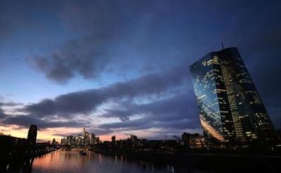 The skyline with its office buildings and the banking district are photographed during sunset as the spread of the coronavirus disease (COVID-19) continues and the German government plans new pandemic control measures in Frankfurt, Germany, November 18, 2021. REUTERS/Kai Pfaffenbach