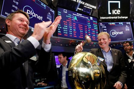 Will Marshall, Co-Founder & CEO of Planet Inc., rings a ceremonial bell to celebrate his company's listing on the floor of the New York Stock Exchange (NYSE) in New York City, U.S., December 8, 2021. REUTERS/Brendan McDermid 