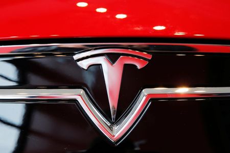 A Tesla logo on a Model S is photographed inside of a Tesla dealership in New York, U.S., April 29, 2016. REUTERS/Lucas Jackson 