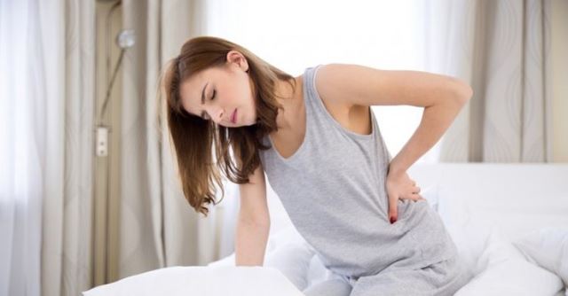 Ноющая боль в спине: причины, диагностика, консультация врача, лечение и профилактика
