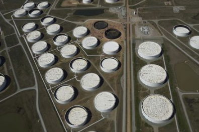FILE PHOTO: Crude oil storage tanks are seen from above at the Cushing oil hub, in Cushing, Oklahoma, March 24, 2016. REUTERS/Nick Oxford