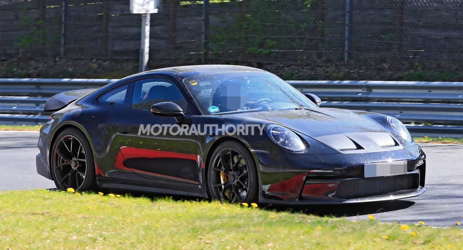 В Сети опубликовали шпионские фото Porsche 911 GT3 2022 года В Сети опубликовали шпионские фото Porsche 911 GT3 2022 года Автомобили