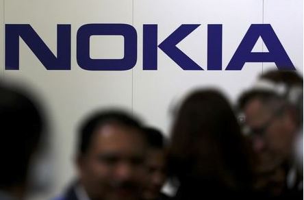 Visitors gather outside the Nokia booth at the Mobile World Congress in Barcelona, Spain, February 26, 2019. REUTERS/Sergio Perez