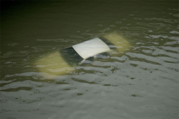 A Car Is Submerged On A Freeway Flooded By Tropical Storm Harvey