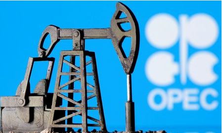 A 3D printed oil pump jack is seen in front of displayed Opec logo in this illustration picture, April 14, 2020. REUTERS/Dado Ruvic/Illustration