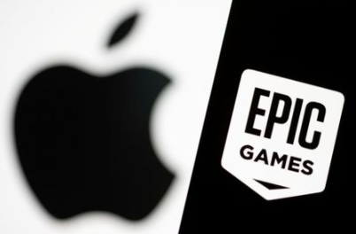 FILE PHOTO: Smartphone with Epic Games logo is seen in front of Apple logo in this illustration taken, May 2, 2021. REUTERS/Dado Ruvic/Illustration/File Photo