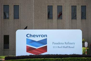 An entrance sign at the Chevron refinery, located near the Houston Ship Channel, is seen in Pasadena, Texas, U.S., May 5, 2019. REUTERS/Loren Elliott