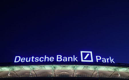 The new logo of the Deutsche Bank Park football stadium, named after Germany's largest business bank, is illuminated for the first time in Frankfurt, Germany, August 20, 2020. REUTERS/Kai Pfaffenbach 